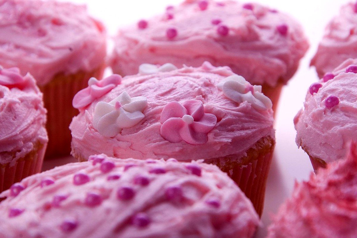STEP 06 for Healthy Strawberry Vanilla Protein Cake with Greek Yogurt Frosting: Frost Cooled Cake & Garnish with Berries